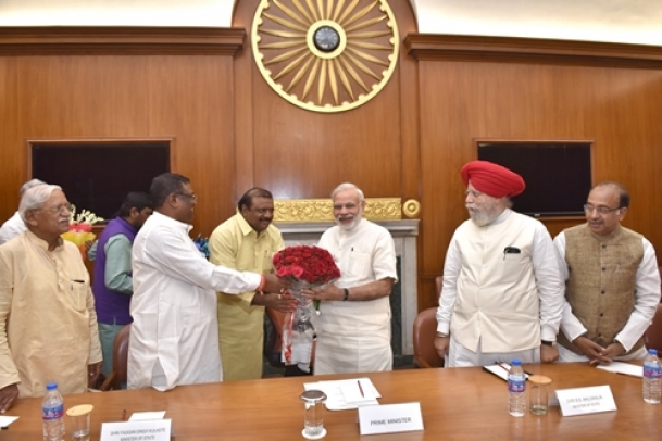 Modi inducts 19 new faces, axes five ministers